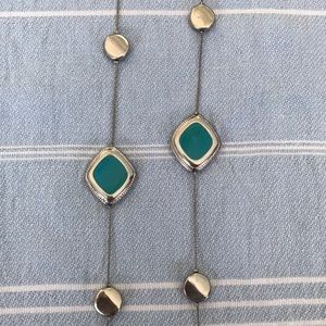 Very long necklace with square-like charms